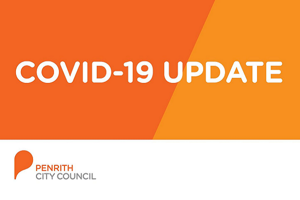 Text: Covid-19 Update on an orange background